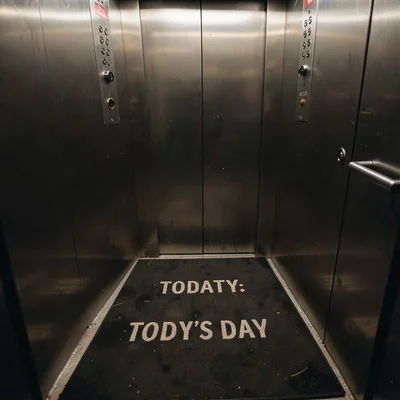 The floor mat with today's day printed on it