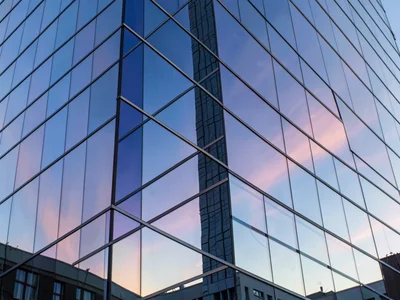 Building corner catching two skies at once
