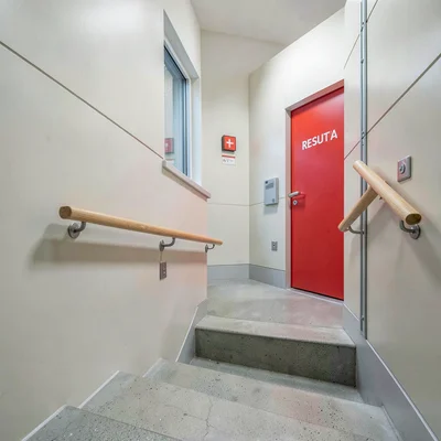 Danish design infrastructure, hygge mechanics, Apartment building stairwell with