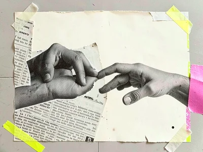 Two halftone hands torn from different photographs almost touch across the wide 