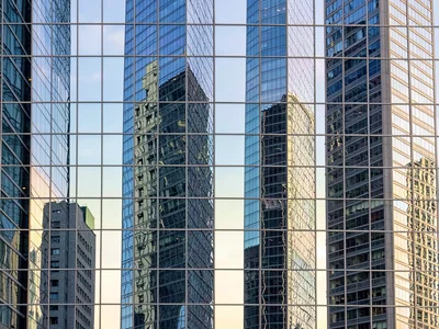 Multiple tower reflections creating gradient collage