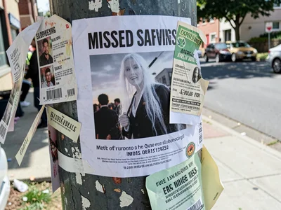 Flyer for event that already happened, posted on pole, the ghost of gathering