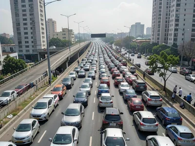 Traffic jam seen from overpass, cars filling frame