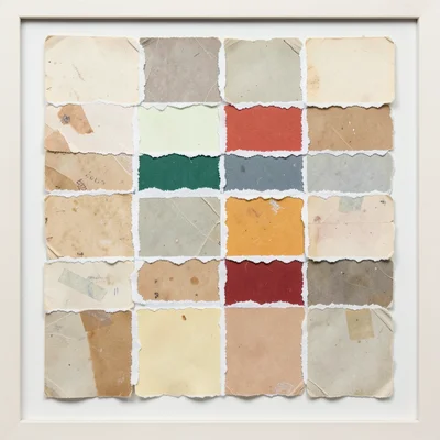 Collage of torn paint swatches from hardware store, grid-like arrangement of col