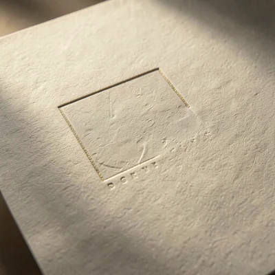 Combination foil and emboss registration, metallic stamp perfectly aligned with 