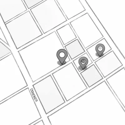 Map illustration of a small downtown grid with a rental lot pin and three drop-o