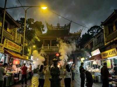 Temple courtyard dusk incense