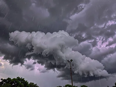 Purple-gray storm clouds low and threatening