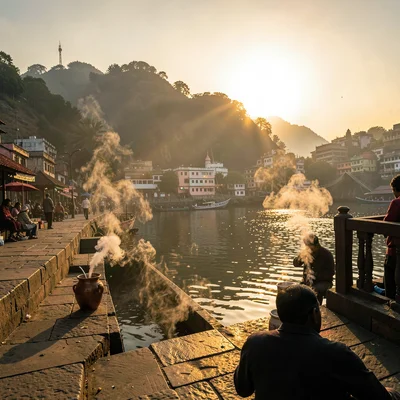 Sacred smoke catching golden Ganges light in Varanasi, First light hitting the e