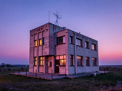 Concrete observatory building catching last pink light