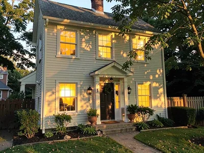 House with all windows lit warm