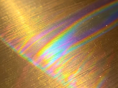 Titanium heat-treated to straw-gold, interference oxide layer on brushed metal s