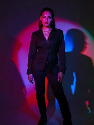 Fashion model in colored shadows