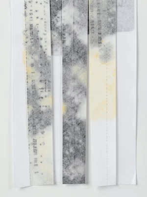 Multiple receipt lengths hanging vertically like paper streamers, varying fade l