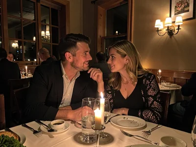 Couple at candlelit restaurant