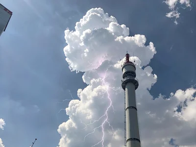 Lightning visible within cloud structure