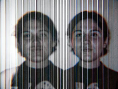 Lenticular animation frame caught between states, motion blur of the optical kin