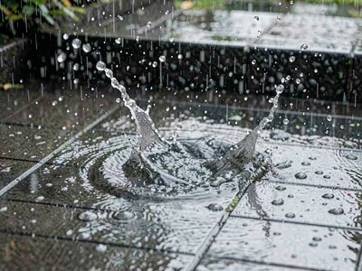 Rain bouncing off tile surface