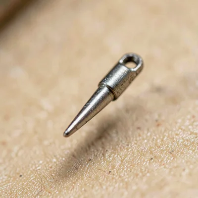 Macro of a steel lace hook with extreme fine taper