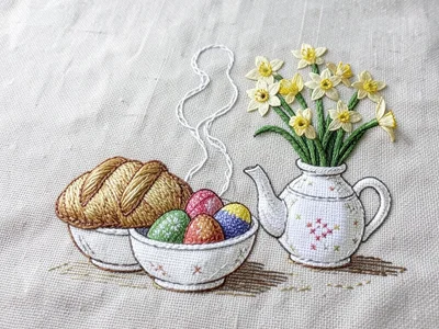 An Easter morning breakfast table stitched in detailed satin stitch — a braided 