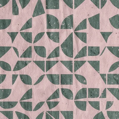 Riso illustration of repeating geometric shapes in dusty pink and forest green