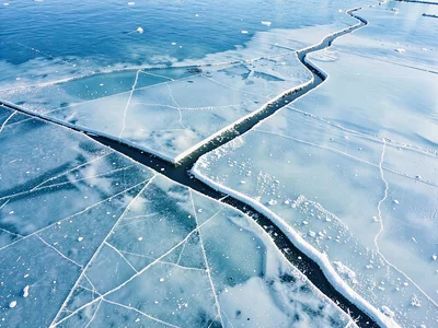 Pressure ridge creating dark line in clear ice