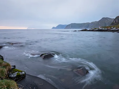 Calm water with subtle current still visible