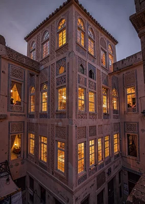 Colored light through qamariya windows in Sana'a, Yemen, tower house corner show