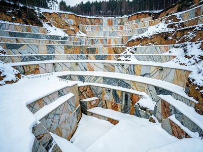 Snow collecting on horizontal quarry surfaces