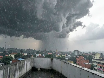 Monsoon wall approaching over city skyline