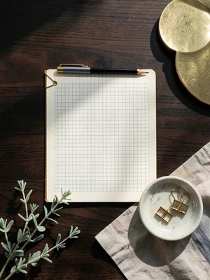 Notebook with Brass Clips on Walnut