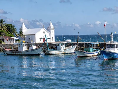 Sunday stillness in Nuku'alofa, Tonga, Empty fishing boats moored for Sunday res