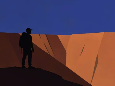 Backpacker silhouette stands at the edge of a vast rust-orange canyon under a de