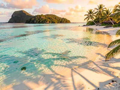 Lagoon turquoise light in Rarotonga, The lagoon at golden hour, water turning fr