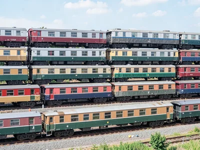 Train cars stacked as parallel lines