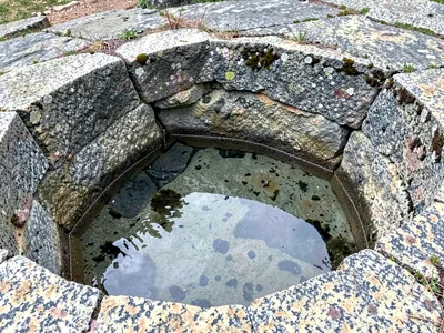 Weathering pit holding rainwater pool