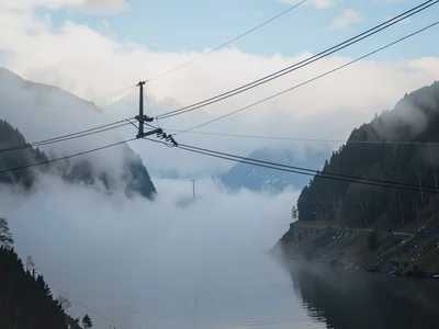 Power lines as geometric element across mist