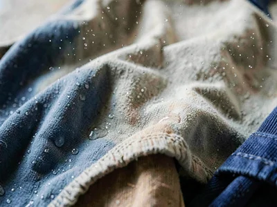 Clothes drying slow in humidity, fabric heavy with absorbed moisture
