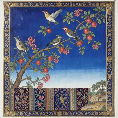 Birds among flowering pomegranate branches against a lapis blue sky