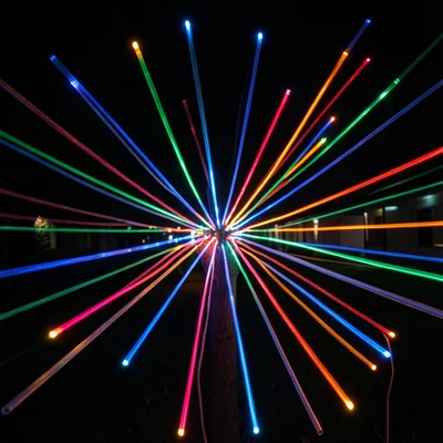 Fiber optic cables arranged in a radial burst pattern, each tip a different colo