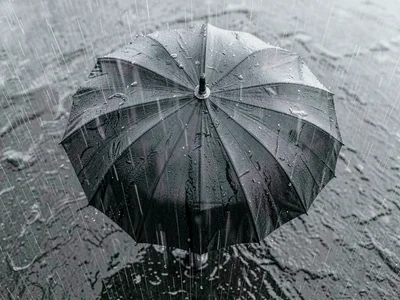 Umbrella pattern from above in rain