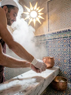 Kessa Exfoliation Ritual Hands on Marble