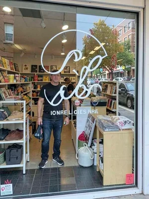 Store window figure overlay