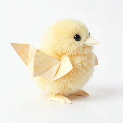 Fluffy butter-yellow lowpoly chick with tiny triangulated wings and a cream beak