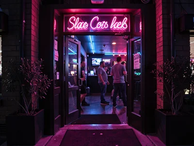 Club entrance with neon spill