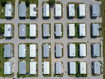 Mobile home park from above, rectangular units in perfect rows