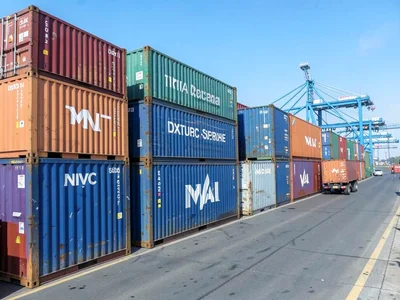 Shipping containers stacked at port