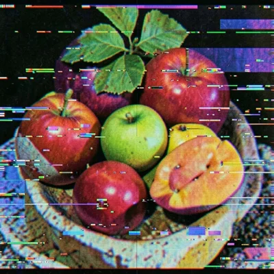 Still life of fruit with macroblock displacement errors, rectangular chunks of t