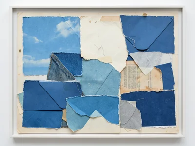 All-blue collage, torn papers in every shade of blue — tissue, magazine sky, pai