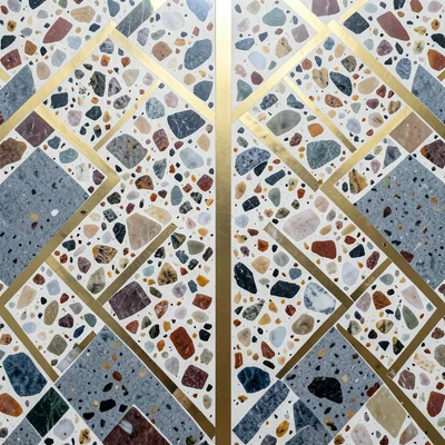 Art Deco terrazzo: geometric sections of different chip colors creating a patter